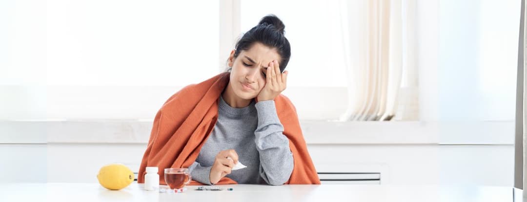 woman sick with the flu